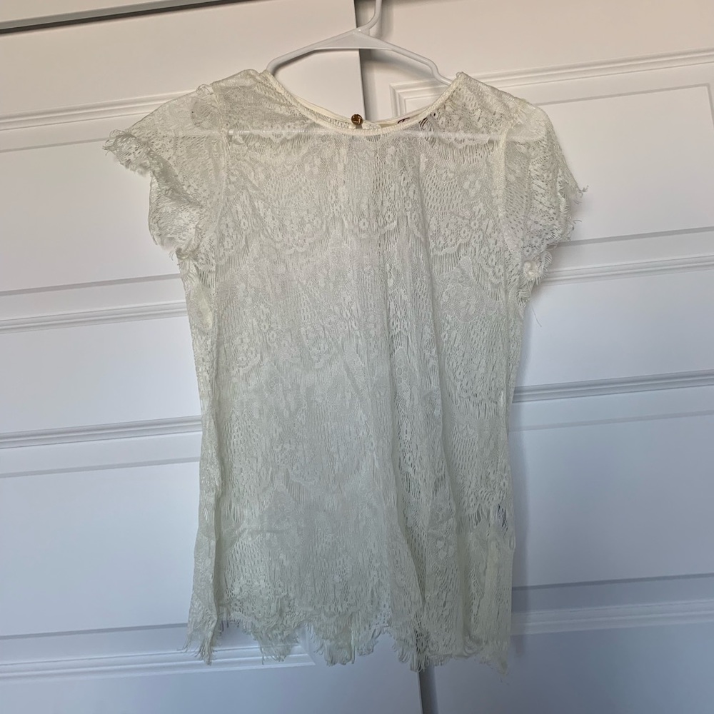 Emmelee sheer white lace top.